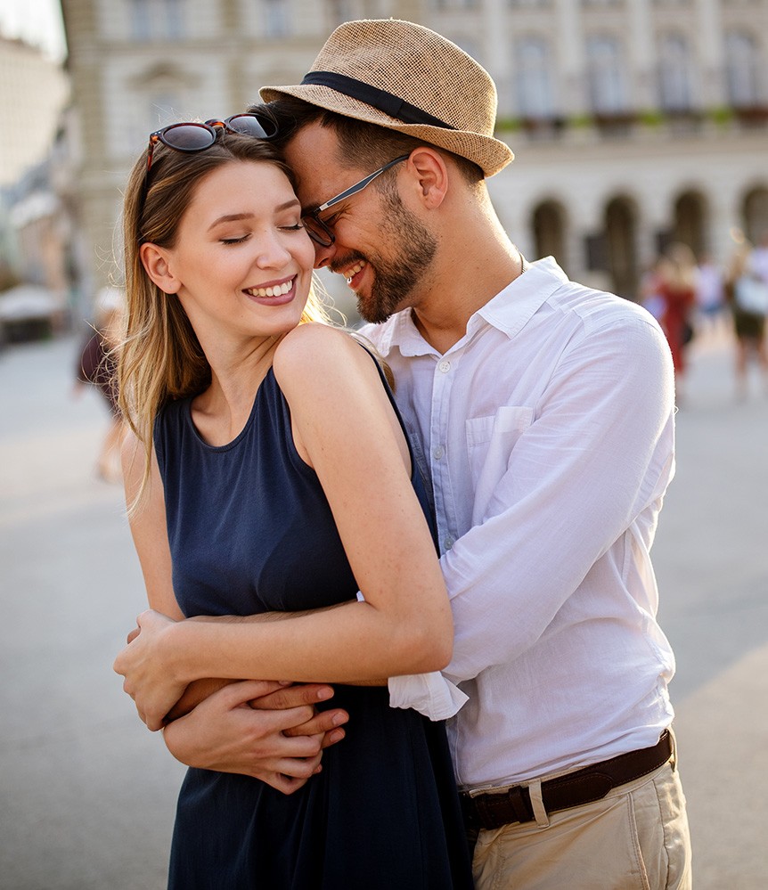 Beautiful couple in love smiling dating outdoors